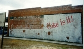 The Baker Block Museum, before a mural was painted over it, on its eastern wall.